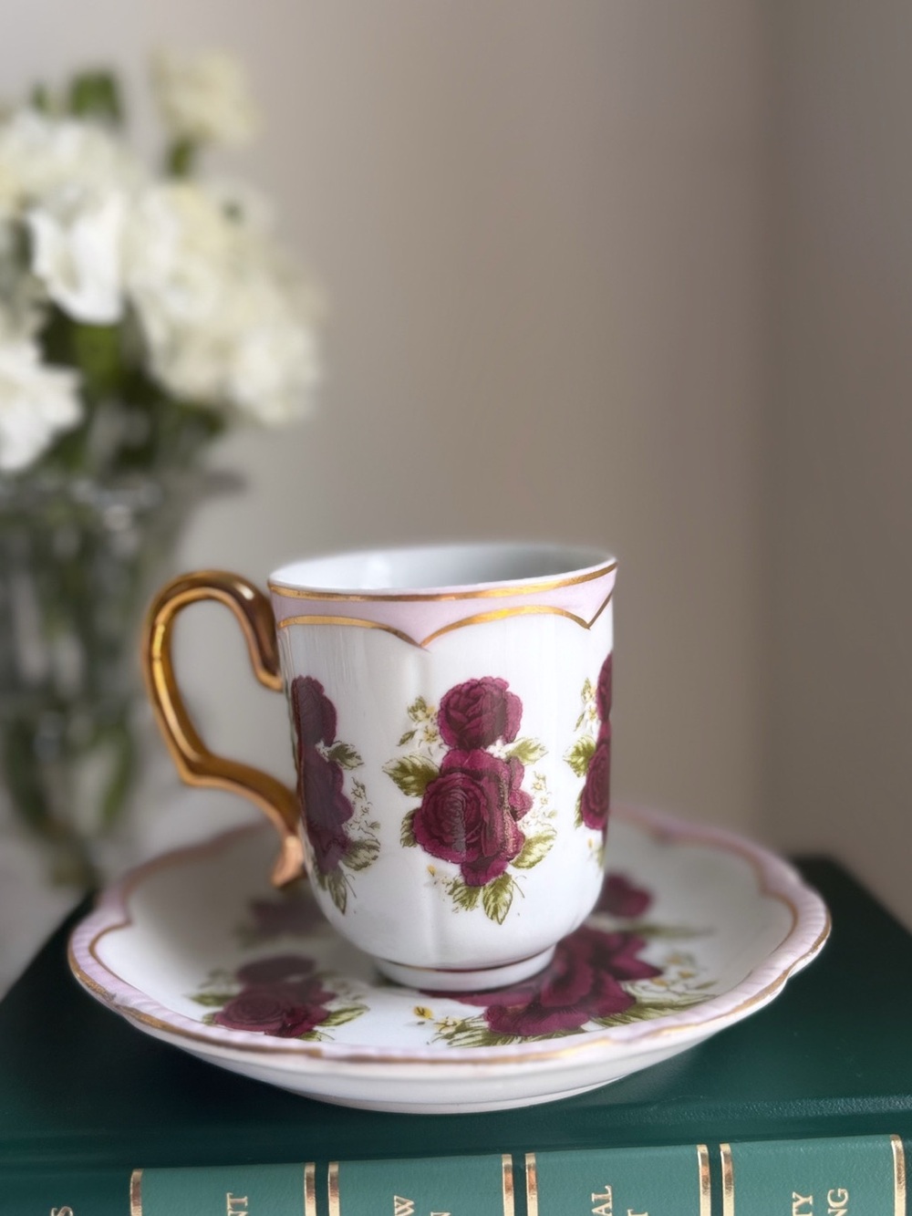 Porcelain Tea Cup and Saucer with Burgundy Rose Pattern and Gold Handle
